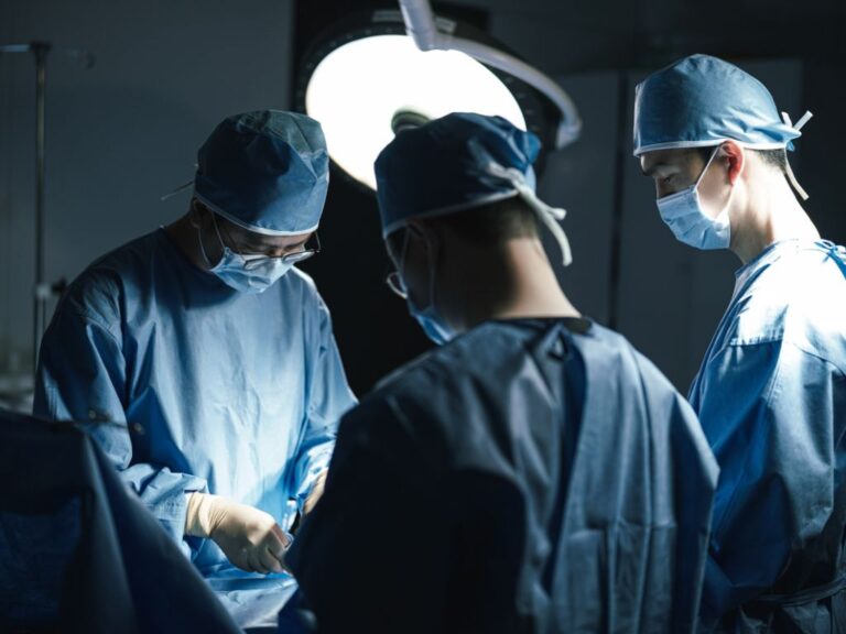 Surgical team performing a procedure for benign prostatic hyperplasia